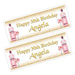 Bottles on pink gin on a happy birthday banner