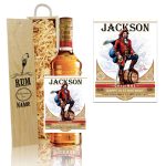 a bottle of liquor next to a box