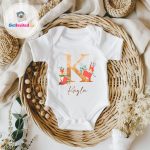 cute woodland animals on a baby vest with a name