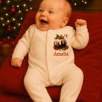 Baby in festive holiday outfit.