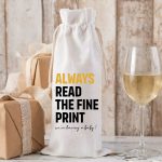 A cream linen wine bottle bag with black text that reads Pairs Well With Becoming Grandparents We Are Having A Baby pregnancy announcement 